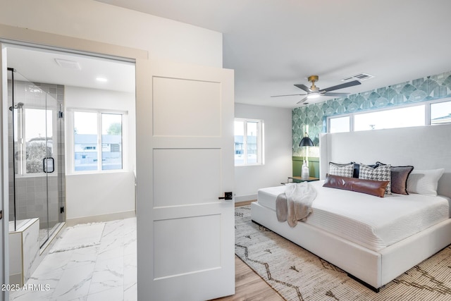 bedroom featuring baseboards, a ceiling fan, and visible vents