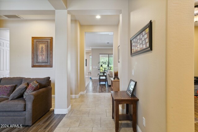 corridor featuring light wood-type flooring