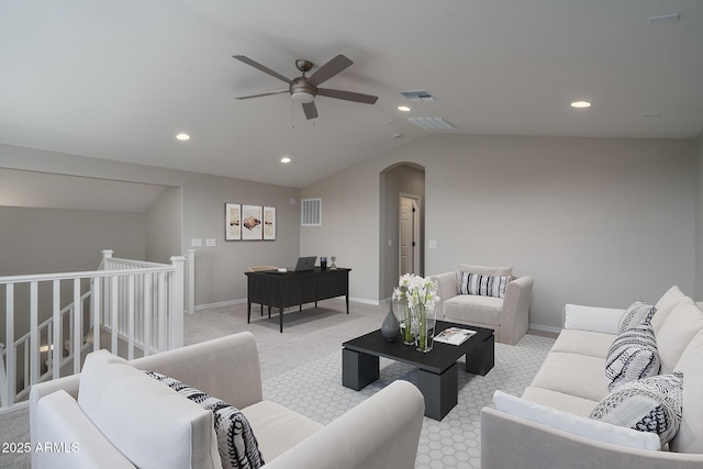 living room featuring lofted ceiling, light carpet, and ceiling fan