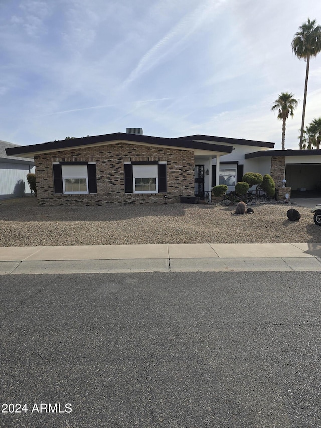 view of front of home with a garage