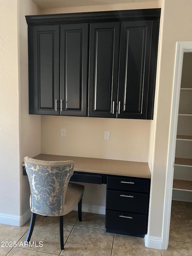 tiled office space with built in desk