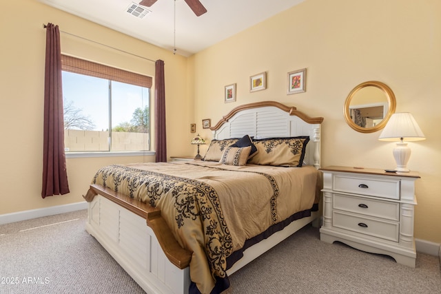 bedroom with light carpet, baseboards, visible vents, and a ceiling fan