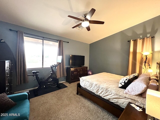 bedroom featuring carpet floors, ceiling fan, visible vents, and vaulted ceiling