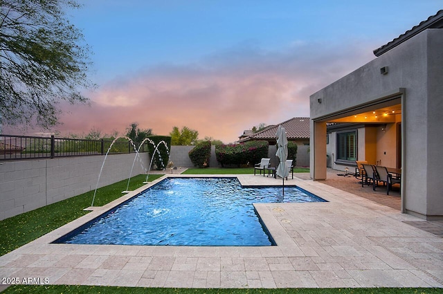 view of pool featuring a fenced backyard, a fenced in pool, and a patio