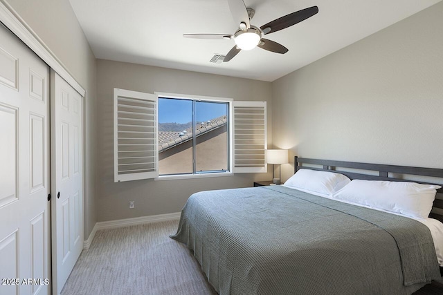 18515 N 97th Way, Scottsdale, AZ 85255 - bedroom featuring carpet, baseboards, a closet, and a ceiling fan