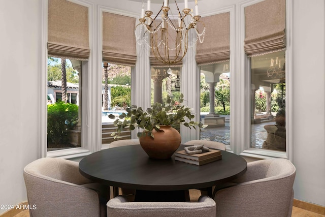 dining area featuring a chandelier