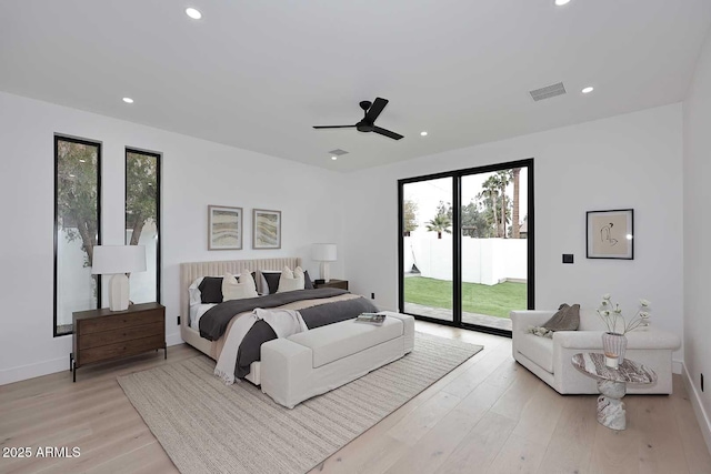 bedroom featuring access to exterior, recessed lighting, visible vents, light wood-style floors, and baseboards