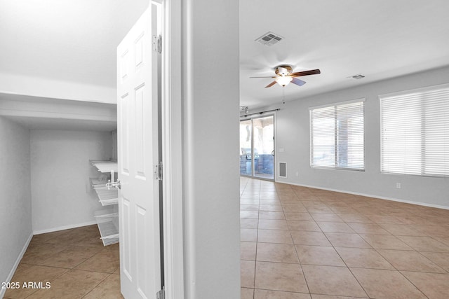 8710 N 182nd Ave, Waddell, AZ 85355 - hallway featuring baseboards, visible vents, and light tile patterned floors