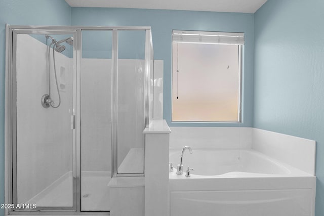 8710 N 182nd Ave, Waddell, AZ 85355 - bathroom with a garden tub and a stall shower