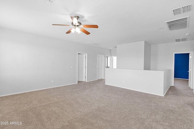8710 N 182nd Ave, Waddell, AZ 85355 - spare room with baseboards, light carpet, and visible vents