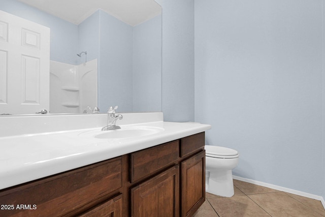 8710 N 182nd Ave, Waddell, AZ 85355 - bathroom featuring walk in shower, vanity, tile patterned floors, baseboards, and toilet