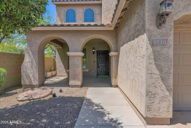 8710 N 182nd Ave, Waddell, AZ 85355 - entrance to property with a tiled roof, fence, and stucco siding