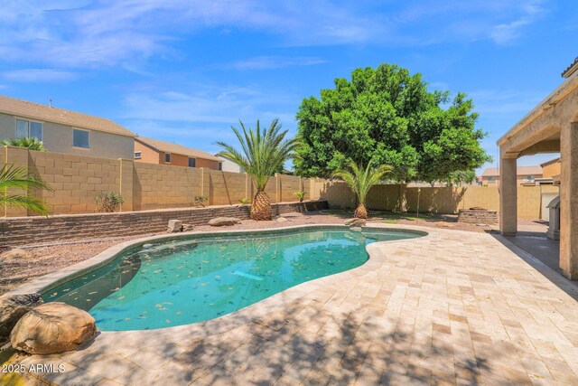 8710 N 182nd Ave, Waddell, AZ 85355 - view of swimming pool with a patio, a fenced in pool, and a fenced backyard