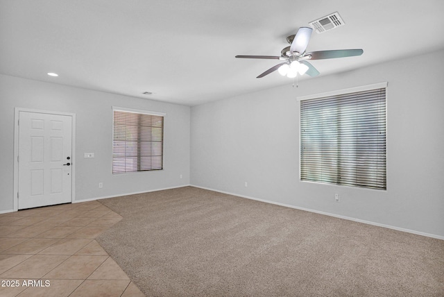 8710 N 182nd Ave, Waddell, AZ 85355 - unfurnished room featuring ceiling fan, light tile patterned floors, baseboards, light carpet, and recessed lighting