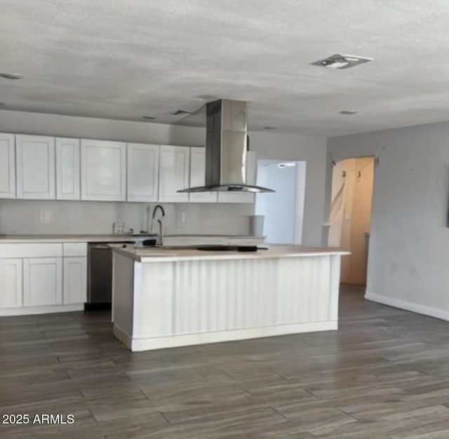 18828 N 17th Dr, Phoenix, AZ 85027 - kitchen with white cabinetry, light countertops, dark wood finished floors, stainless steel dishwasher, and extractor fan