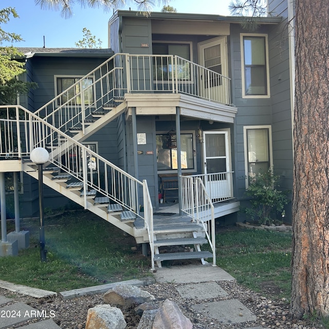 rear view of house with stairway