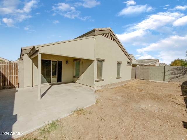 back of house featuring a patio