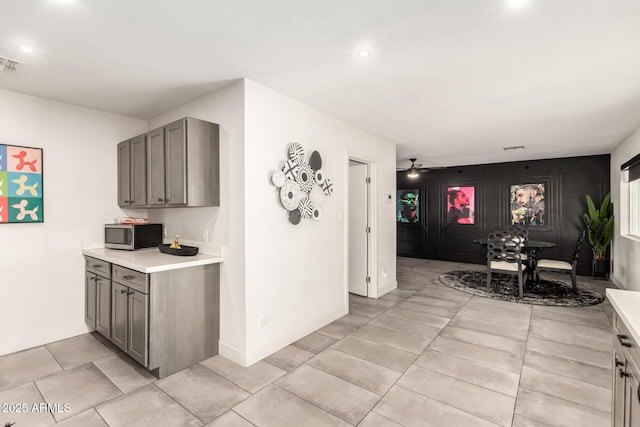 kitchen featuring ceiling fan