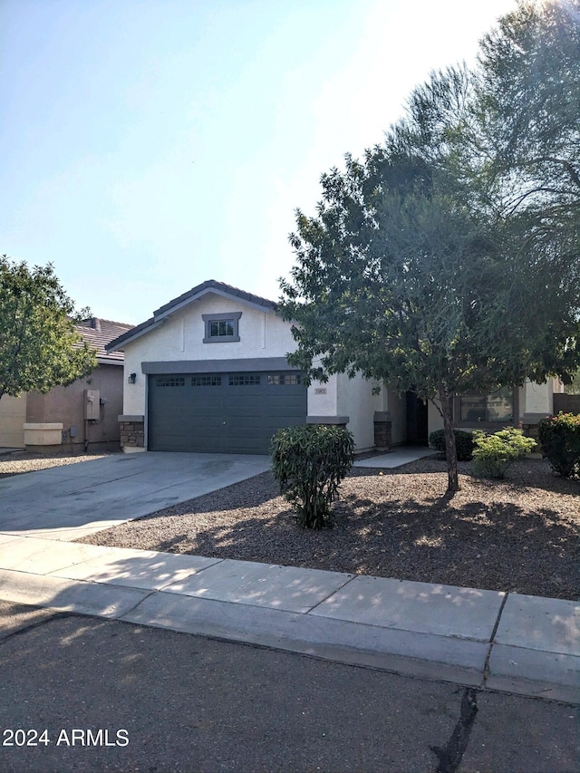 view of front of property featuring a garage