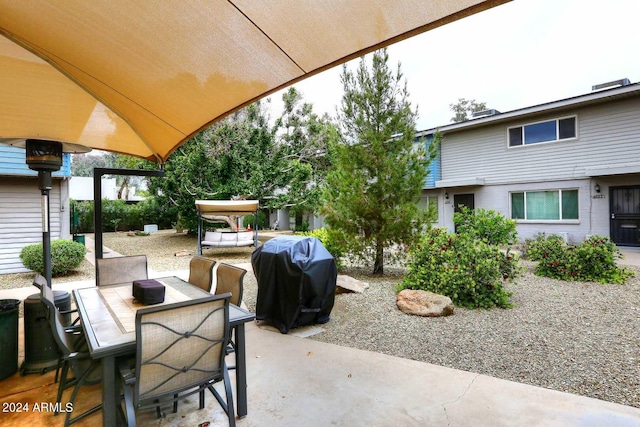 view of patio / terrace featuring a grill