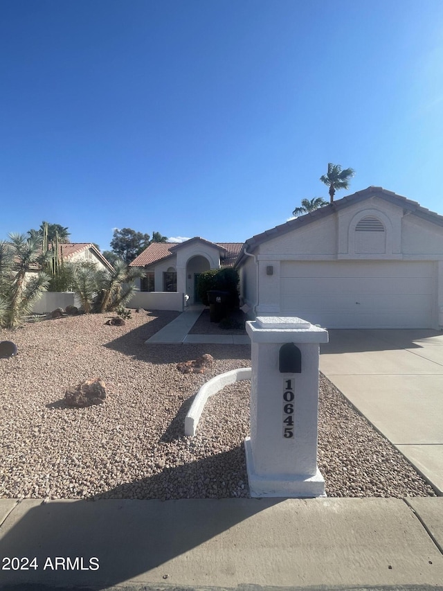 view of front of home with a garage