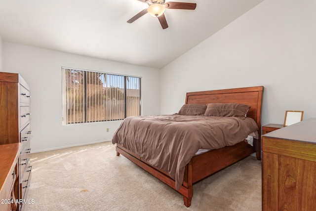 carpeted bedroom with ceiling fan and lofted ceiling