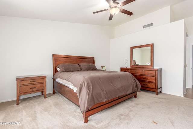 bedroom with light carpet and ceiling fan