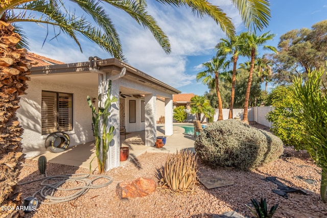 rear view of house with a patio