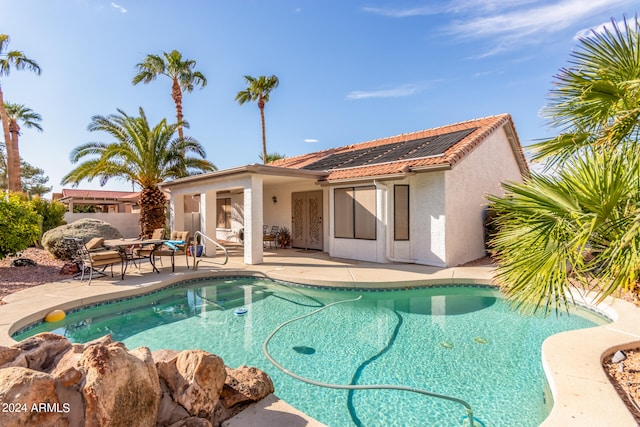 view of pool featuring a patio area