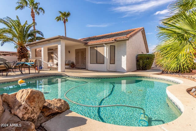 view of pool with a patio