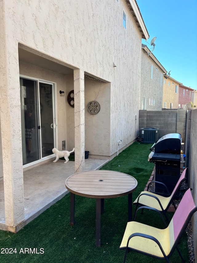 view of patio with cooling unit