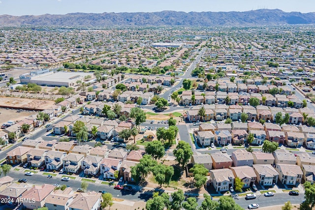 drone / aerial view featuring a mountain view