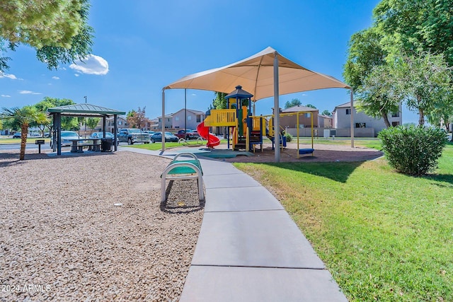 view of play area featuring a gazebo and a lawn