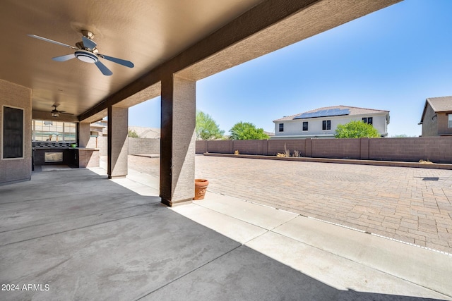 view of patio / terrace featuring ceiling fan