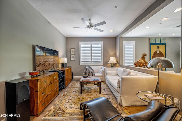 living room with ceiling fan