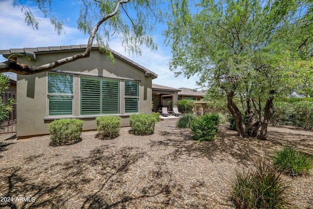 back of property with a patio area