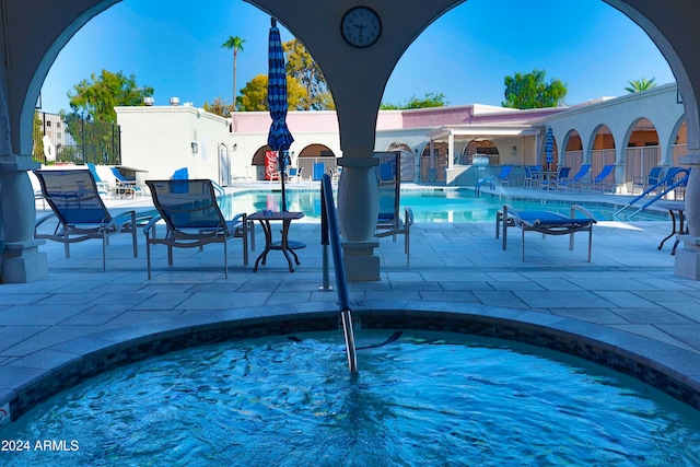 view of pool featuring a patio area