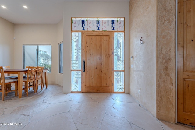 foyer with recessed lighting