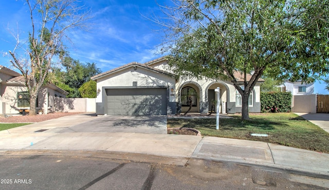 10402 E Javelina Ave, Mesa, AZ 85209 - view of front of house with an attached garage, driveway, stucco siding, and a tile roof
