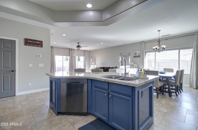 10402 E Javelina Ave, Mesa, AZ 85209 - kitchen featuring a sink, blue cabinetry, open floor plan, a chandelier, and an island with sink