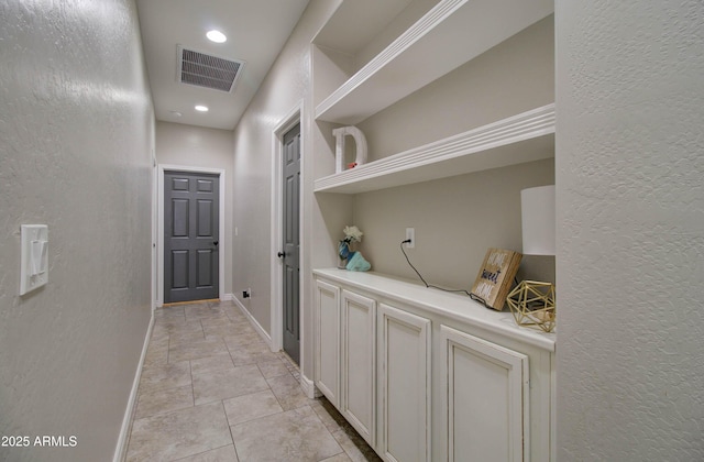 10402 E Javelina Ave, Mesa, AZ 85209 - hall featuring a textured wall, baseboards, and recessed lighting