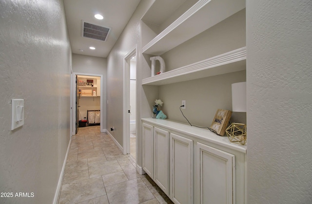 10402 E Javelina Ave, Mesa, AZ 85209 - hallway with baseboards, a textured wall, and recessed lighting