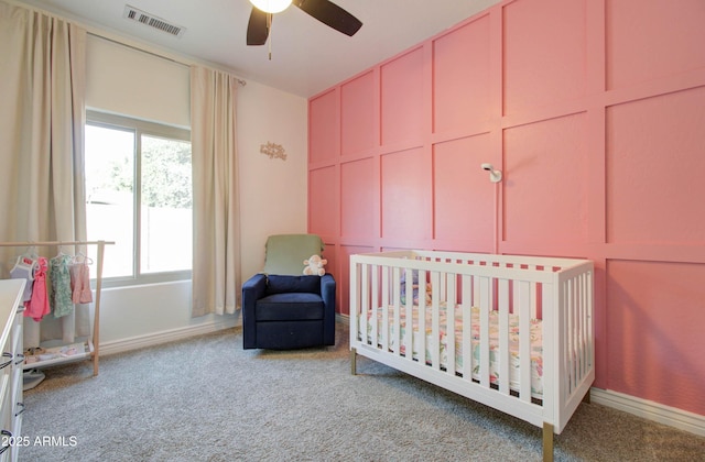 10402 E Javelina Ave, Mesa, AZ 85209 - carpeted bedroom with a crib and baseboards