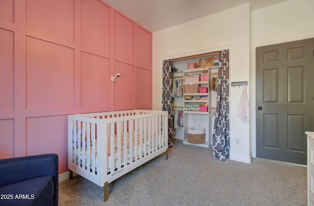 10402 E Javelina Ave, Mesa, AZ 85209 - bedroom featuring a closet, carpet flooring, a nursery area, and baseboards