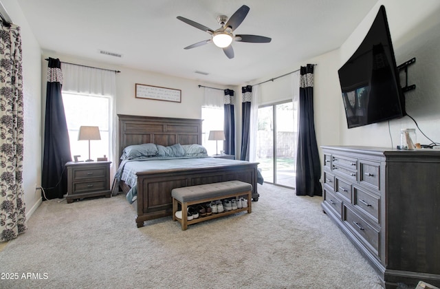 10402 E Javelina Ave, Mesa, AZ 85209 - bedroom featuring access to exterior, light carpet, and ceiling fan