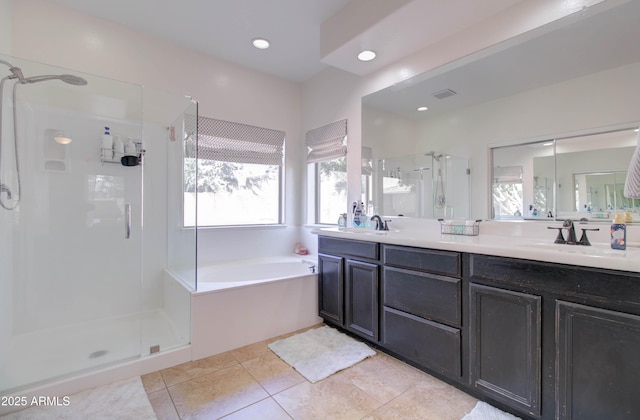 10402 E Javelina Ave, Mesa, AZ 85209 - bathroom with a stall shower, a bath, double vanity, healthy amount of natural light, and recessed lighting