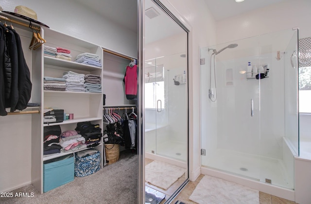 10402 E Javelina Ave, Mesa, AZ 85209 - full bath with a stall shower, a walk in closet, and healthy amount of natural light