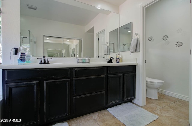 10402 E Javelina Ave, Mesa, AZ 85209 - bathroom featuring double vanity, toilet, and a shower