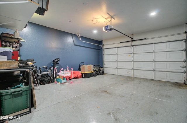 10402 E Javelina Ave, Mesa, AZ 85209 - garage featuring a garage door opener and recessed lighting