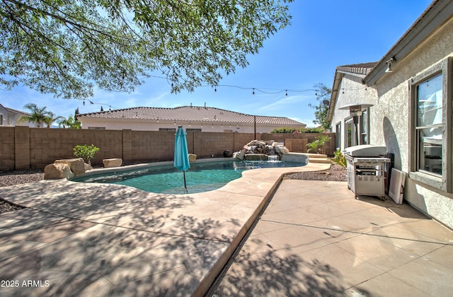 10402 E Javelina Ave, Mesa, AZ 85209 - view of pool with a fenced backyard, a patio, and area for grilling